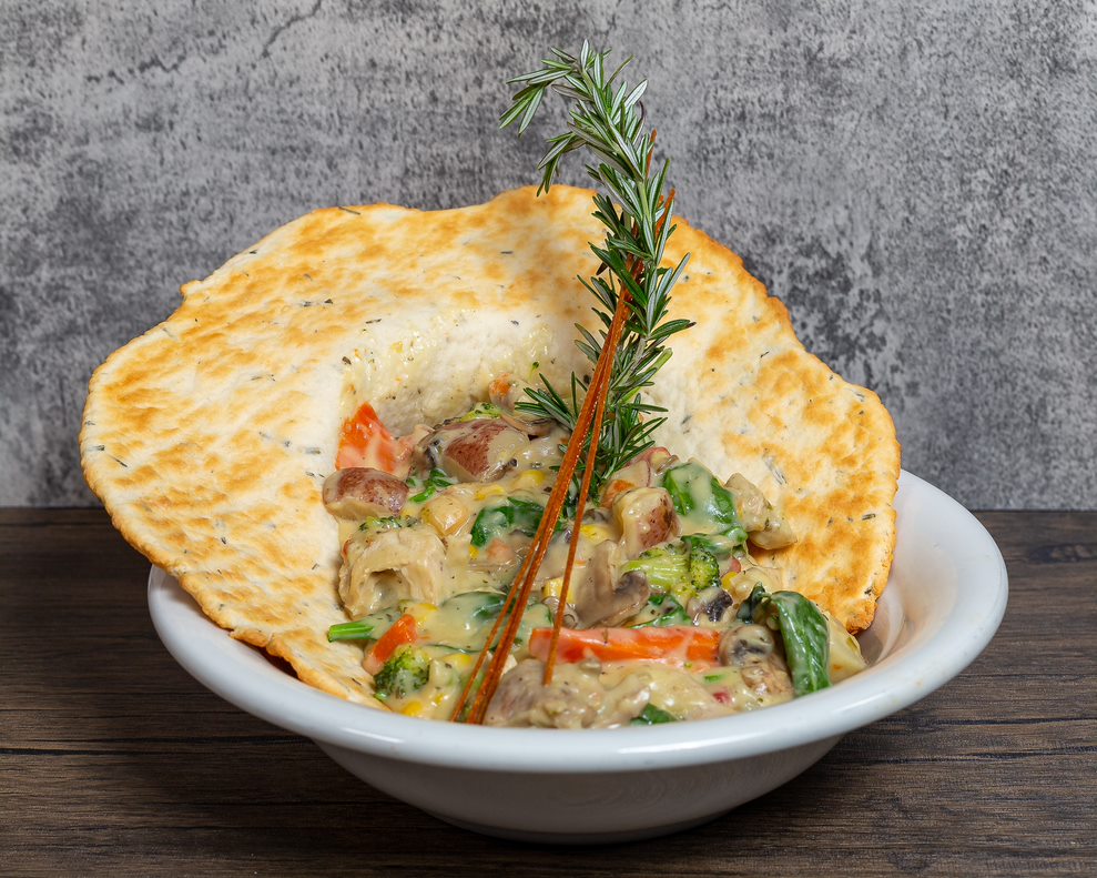 Hash House A Go Go’s signature chicken pot pie—one of the customer favorites at Mohegan Sun, featuring tender chicken, fresh vegetables, and a flaky crust.